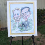 display of wedding caricature at wedding